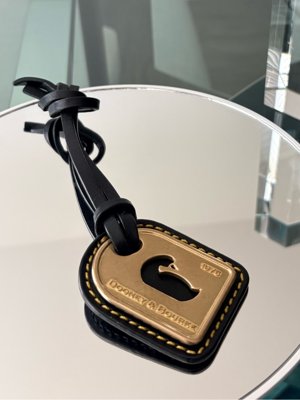 Dooney & Bourke Black Leather & Gold Logo Tag